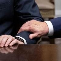 White House blames Trump's bandaged hand on handshakes