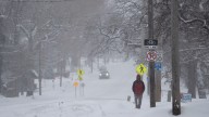Snow continues to fall as Iowans brace for frigid temperatures