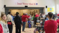 Kroger's annual 'Shoe Day' provides holiday gifts to IPS students