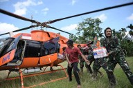Death toll passes 1,500 in Asia floods