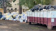 Heaps of trash bags that may contain medical waste left outside soon