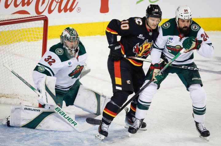 Flames dominate late to douse Wild point streak