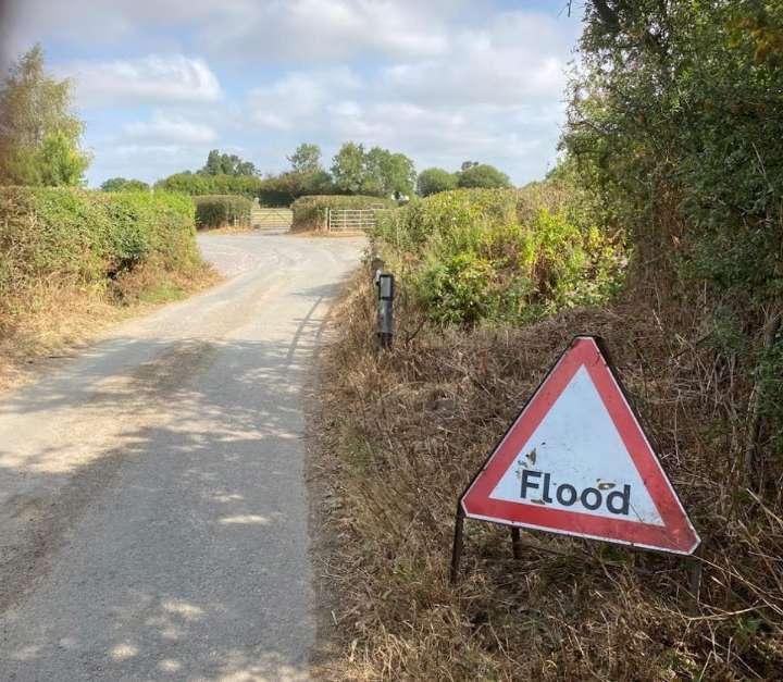 Person pulled free from car stuck in Oswestry floodwater