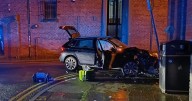 Car smashes into wall after police chase through Liverpool city centre