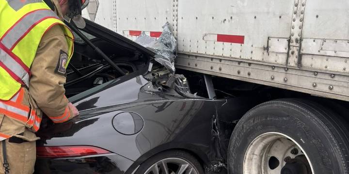 Car pinned under semi-truck in Southern Kentucky crash on I