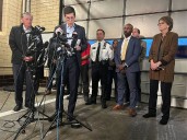 Police have person of interest in custody over Brown University shooting that killed 2, wounded 9