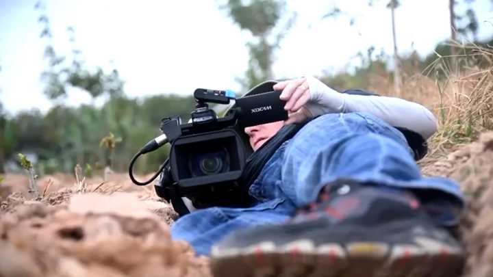 Al Jazeera crew takes cover from Thailand-Cambodia artillery duel