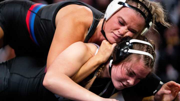 See photos as Ankeny girls wrestling takes on Raccoon River