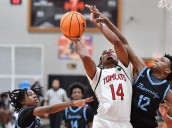 Basketball: Unknown Jason Moore steps up for East Aurora