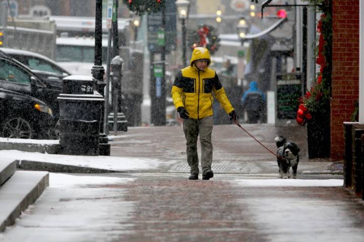 Winter's first big snowstorm hits the Northeast as schools close and traffic slows