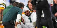 Packers pass rushing standout Micah Parsons hurts left knee on non
