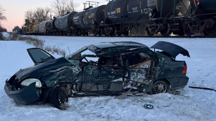 Driver hospitalized after car struck by train in Ionia County