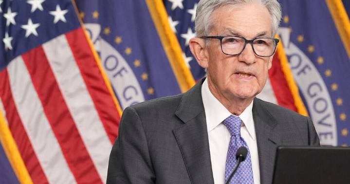 Federal Reserve cuts key rate, sees healthier economy next year