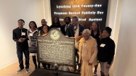 Bullet-pocked marker memorializing 1918 lynching goes on display in Atlanta