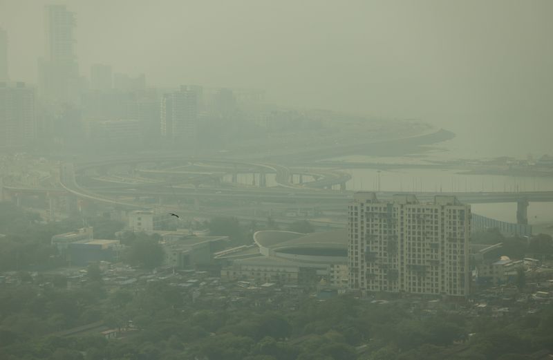 India tightens pollution curbs as Delhi's air quality worsens