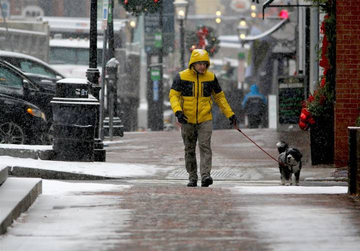 Winter's first big snowstorm hits the Northeast as schools close and traffic slows