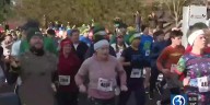 Runners, volunteers and holiday gear at the Hartford Marathon Foundation’s 5K mitten run