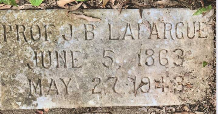Why did filmmaker Ken Burns travel to Alexandria in 2023 to learn about a man named J.B. Lafargue?