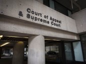 B.C. couple ordered to pay neighbours $443,000 in 'vile' fight over shared driveway