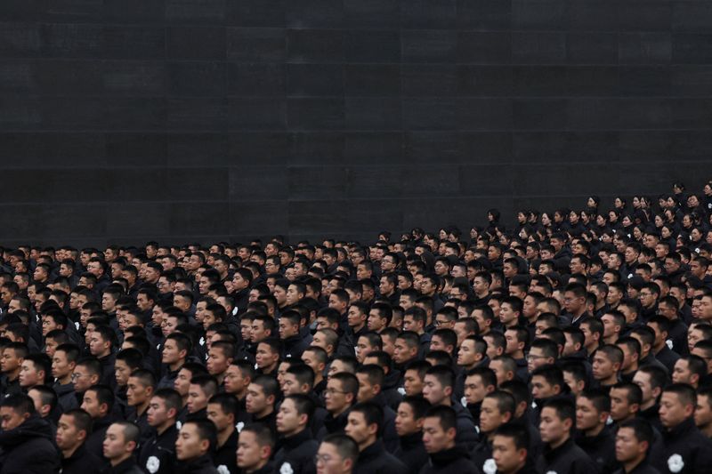 China holds low-key Nanjing Massacre memorial despite Japan tensions