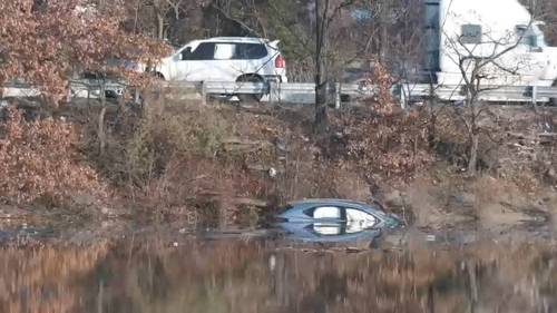 Car careens into Passaic River during three
