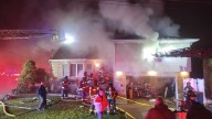 2 Firefighters Injured As Flames Tear Through North Bellmore Home: Arson Squad