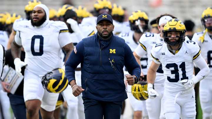 Ex-Michigan coach Sherrone Moore charged with felony home invasion, stalking