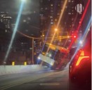 NJ Transit Bus Mounts Barrier In Jersey City