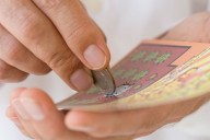 Man Wins Big in Lottery After Finding Scratch-Off Ticket Left on Store Counter