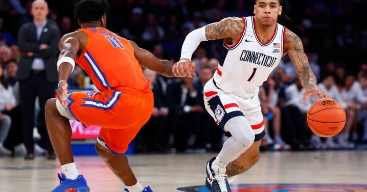 Ball scores 19 points as No. 5 UConn beats No. 18 Florida 77