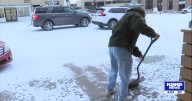 Early morning Kansas snow brings out shovels before dawn