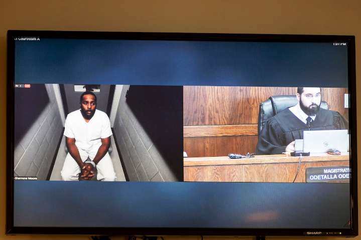 Fired Michigan coach Sherrone Moore arraigned on stalking, other charges