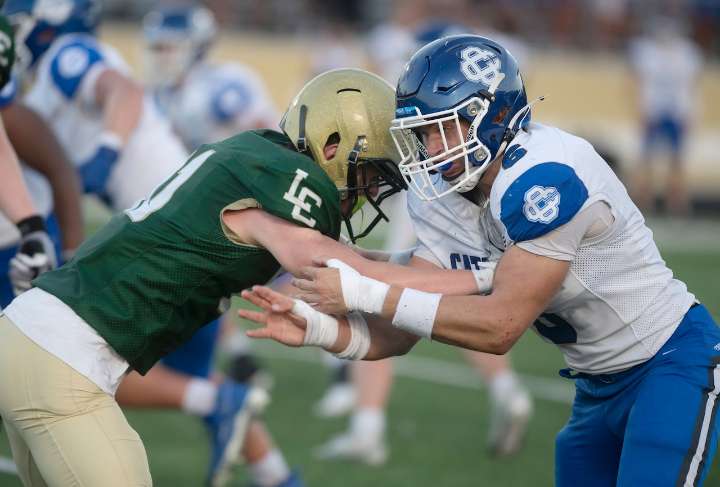 GR Catholic Central’s Brayden Sweeney achieves dream by signing with Big Ten team