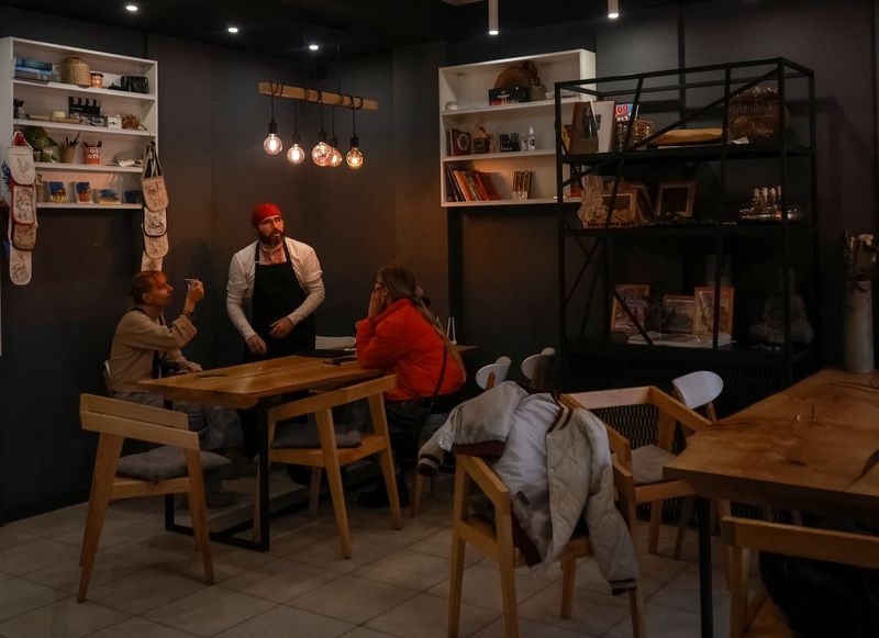 Haven cafe shuts as Russian attacks turn Ukraine's Kherson into ghost town