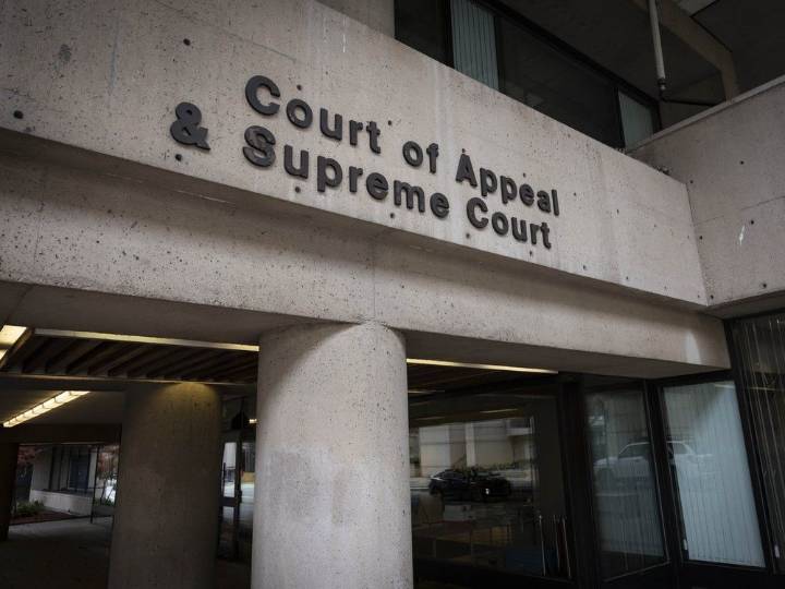 B.C. couple ordered to pay neighbours $443,000 in 'vile' fight over shared driveway