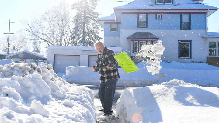 What age should you give up shoveling snow? Here's what heart experts say