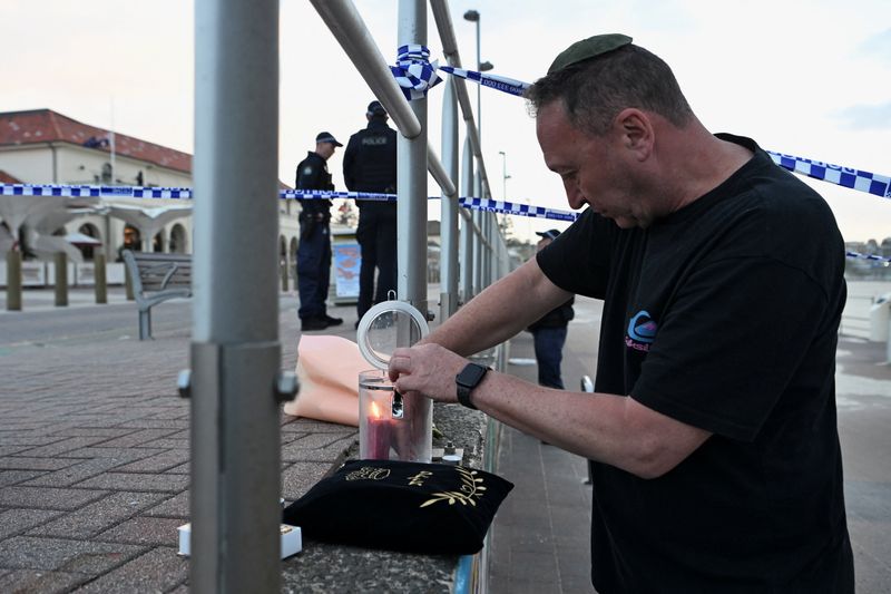 Father and son behind Bondi mass shooting, Australia police say