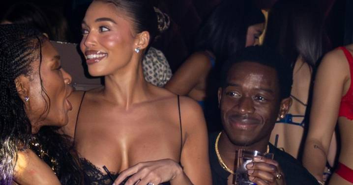 Lori Harvey in Sheer Lace Dress Sits on Damson Idris’ Lap in Photos