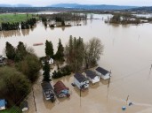 ‘Catastrophic flooding’ lingers in Pacific Northwest as heavy rains ease