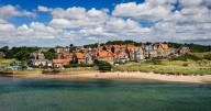 Northumberland seaside village with independent shops and colourful houses