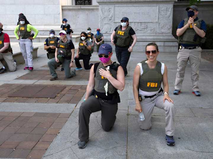 FBI agents allege wrongful termination for kneeling during US protest