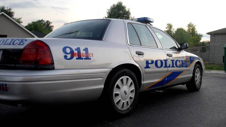 LMPD officer hospitalized following downtown car crash