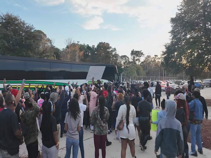 Thousands celebrate return of Raines Vikings to Jacksonville with state champion title