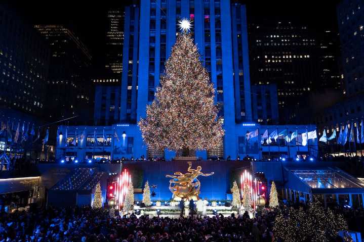 The Rockefeller Center Christmas tree, a holiday icon, is illuminated in New York