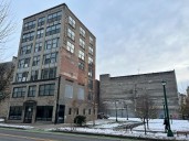 Downtown building owner sues to pause work on massive new Syracuse hotel