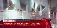 Omaha firefighter injured while battling storage facility fire in icy conditions