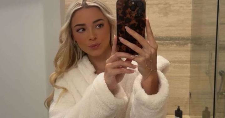 Livvy Dunne's Bathrobe Photos Show Bathroom Glam Routine