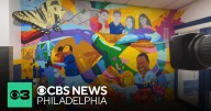 Philadelphia students help unveil mural at 39th police district station
