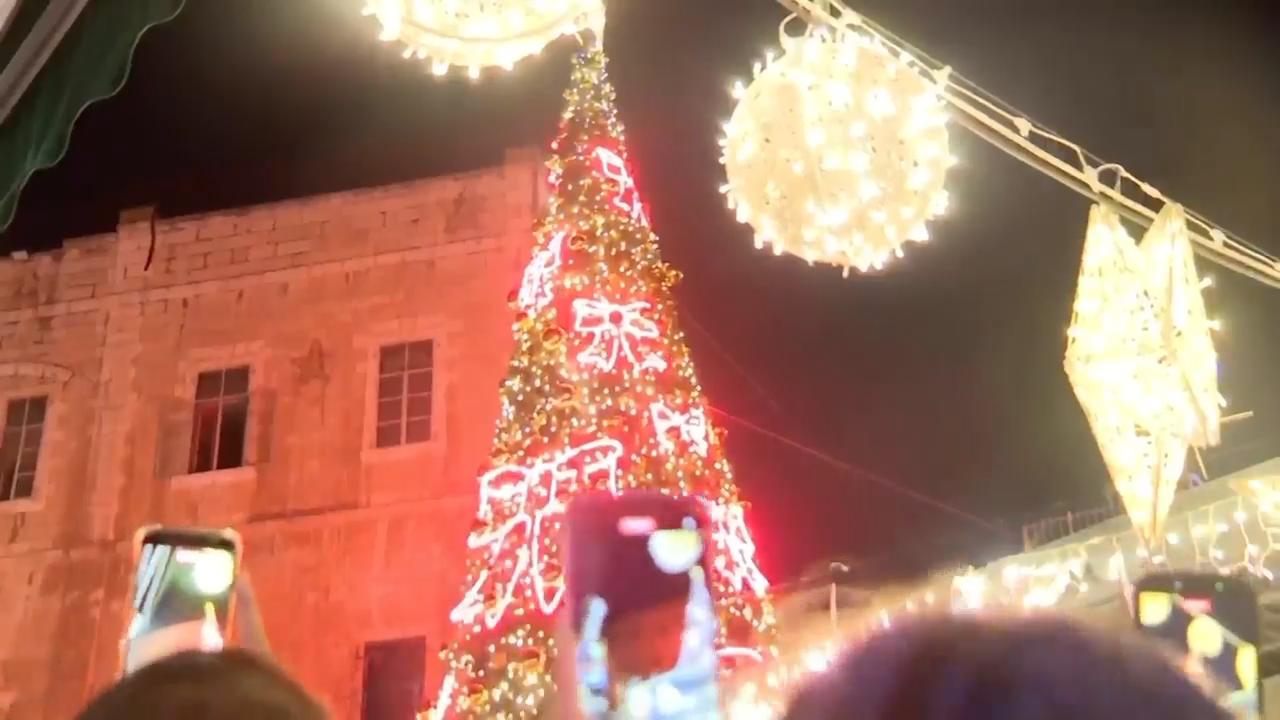 Christmas tree lit up in Jerusalem’s Old City Christian quarter for first time since Gaza war