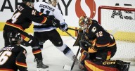 Wolf's 28-save shutout leads Calgary Flames to 2